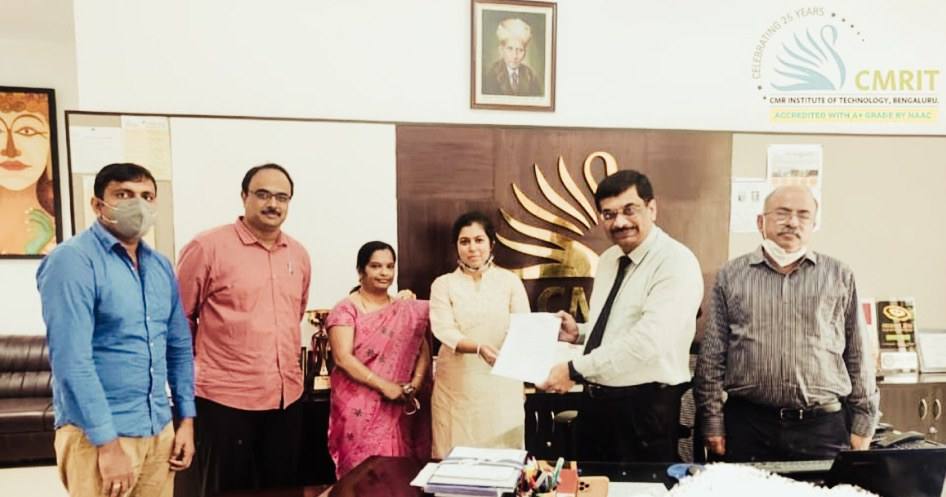 Exchanging the signed MoU with the leadership of CMR Institute of Technology