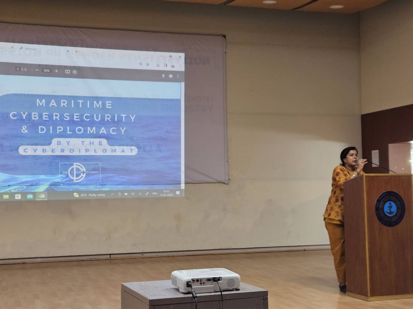 Sanjana Rathi presenting the opening slide, Maritime Cybersecurity & Diplomacy by The CyberDiplomat, at Indian Maritime University