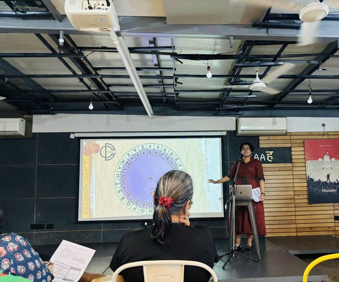 Sanjana Rathi presenting a cipher wheel at RAAH, Pune