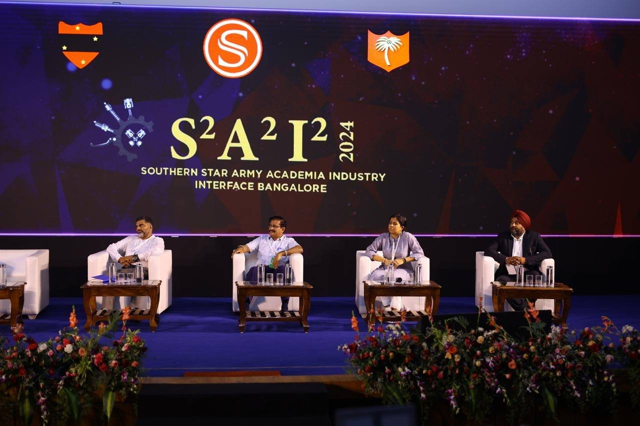 The panel on stage under the S2A2I2 2024 backdrop
